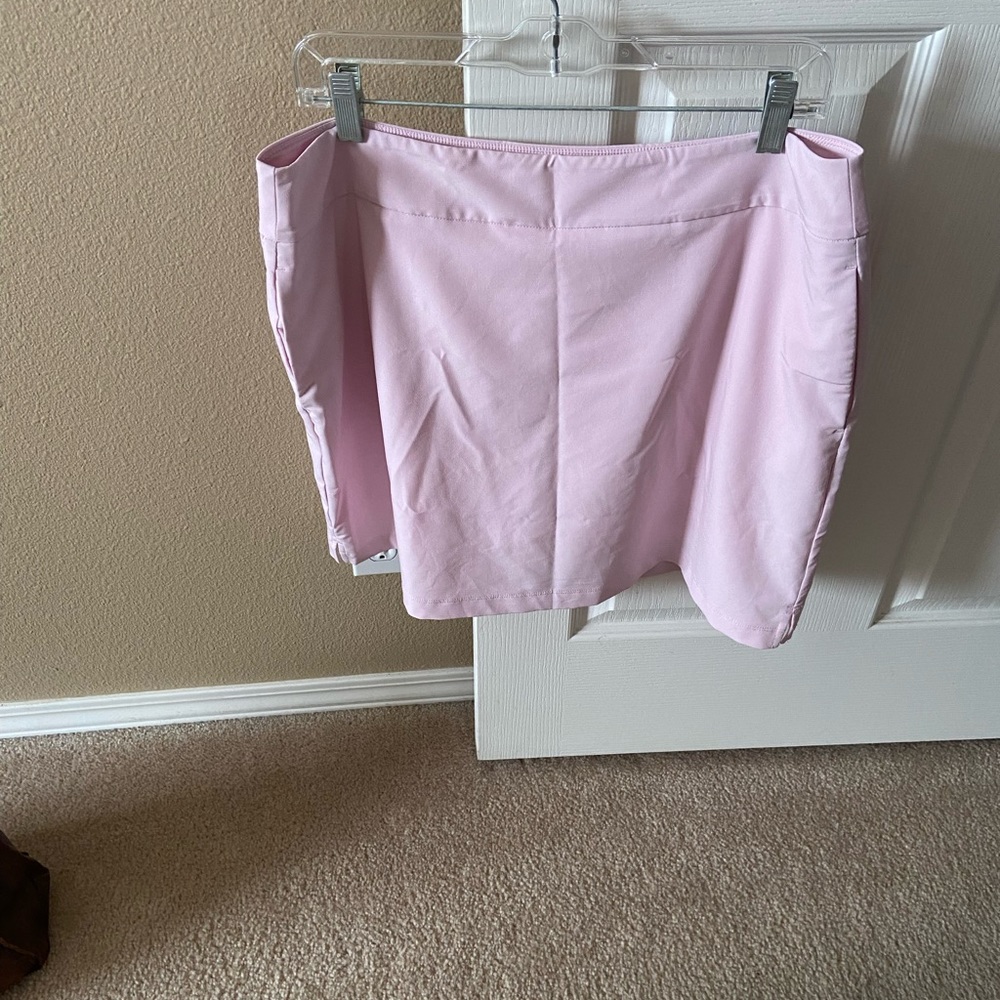 New skort size Large with pockets.